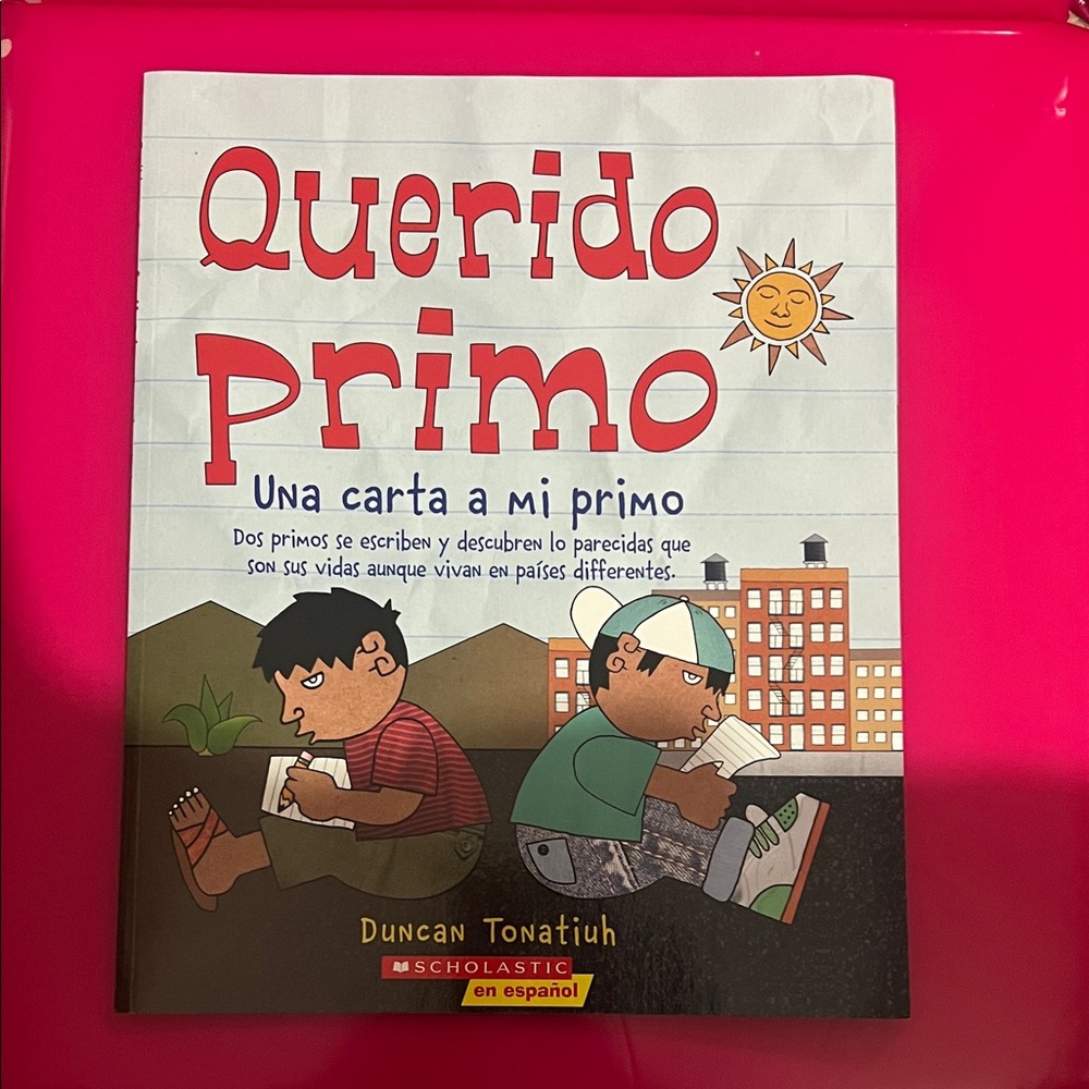 Scholastic Querido Primo Book with Red and Black Cover New